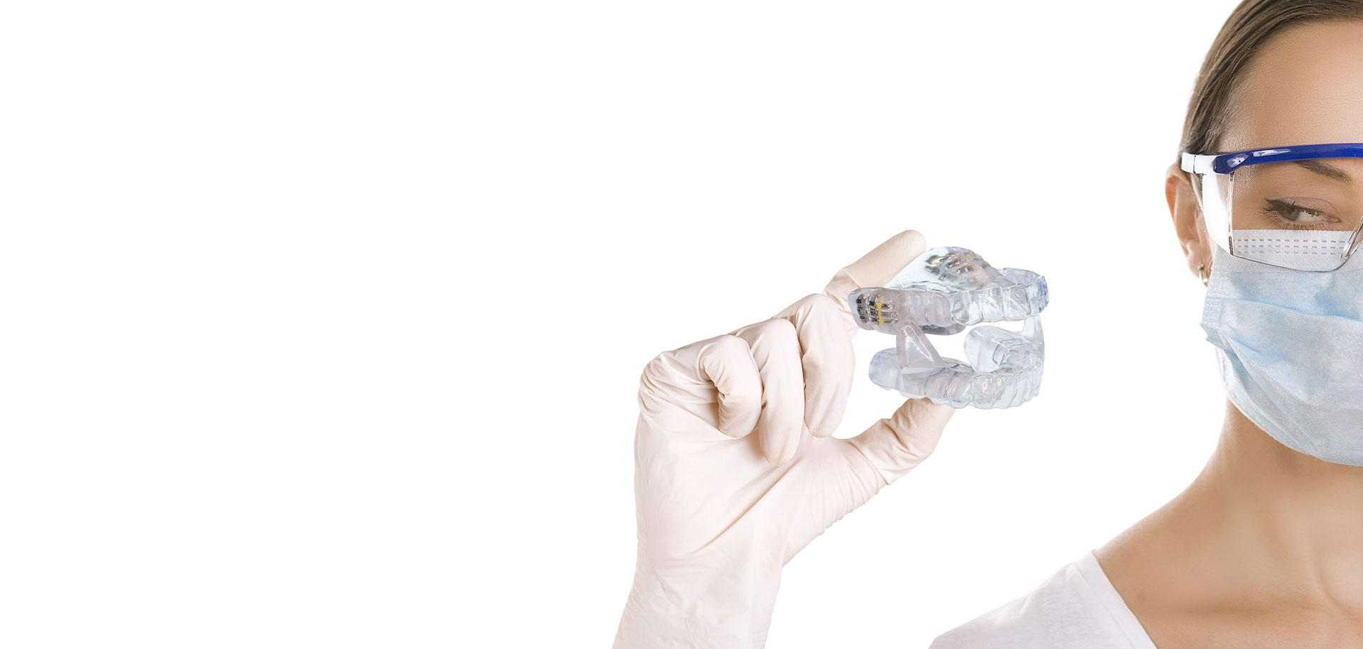 Clear aligner sleep appliance being held up